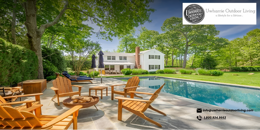 Luxury outdoor patio furniture beside a swimming pool in a spacious backyard