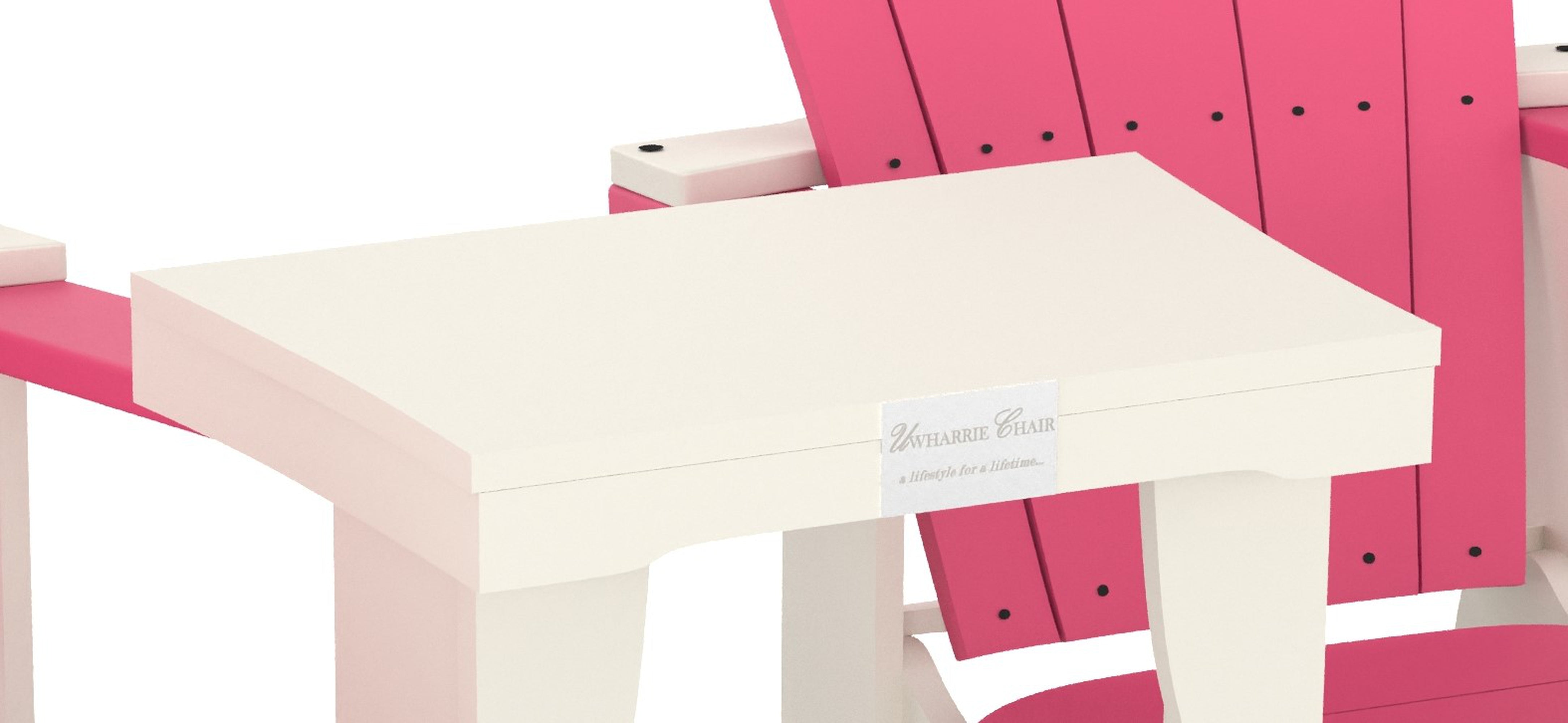 White square outdoor side table with pink Adirondack chairs in the background